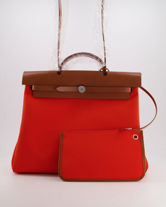 Hermès Herbag 39 in Orange Mecano Toile Canvas and Fauve Vache Hunter Leather with Palladium Hardware