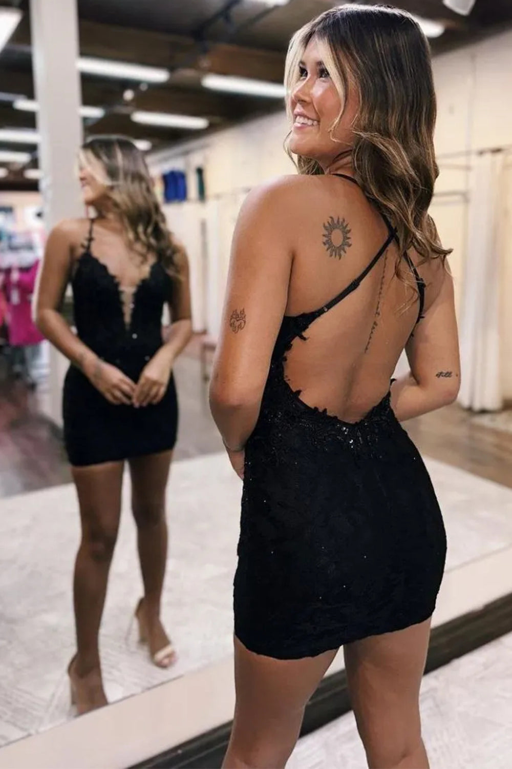 Chic Black Tight Homecoming Dress with Appliques and Criss-Cross Back