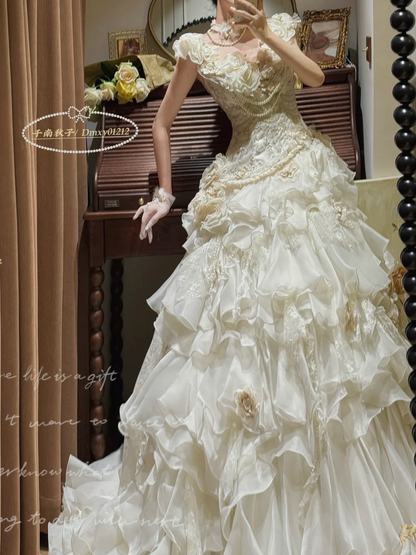 Luxurious Ivory Off-Shoulder 3D Floral Ruffled Pearl Accents Wedding Dress TP5333